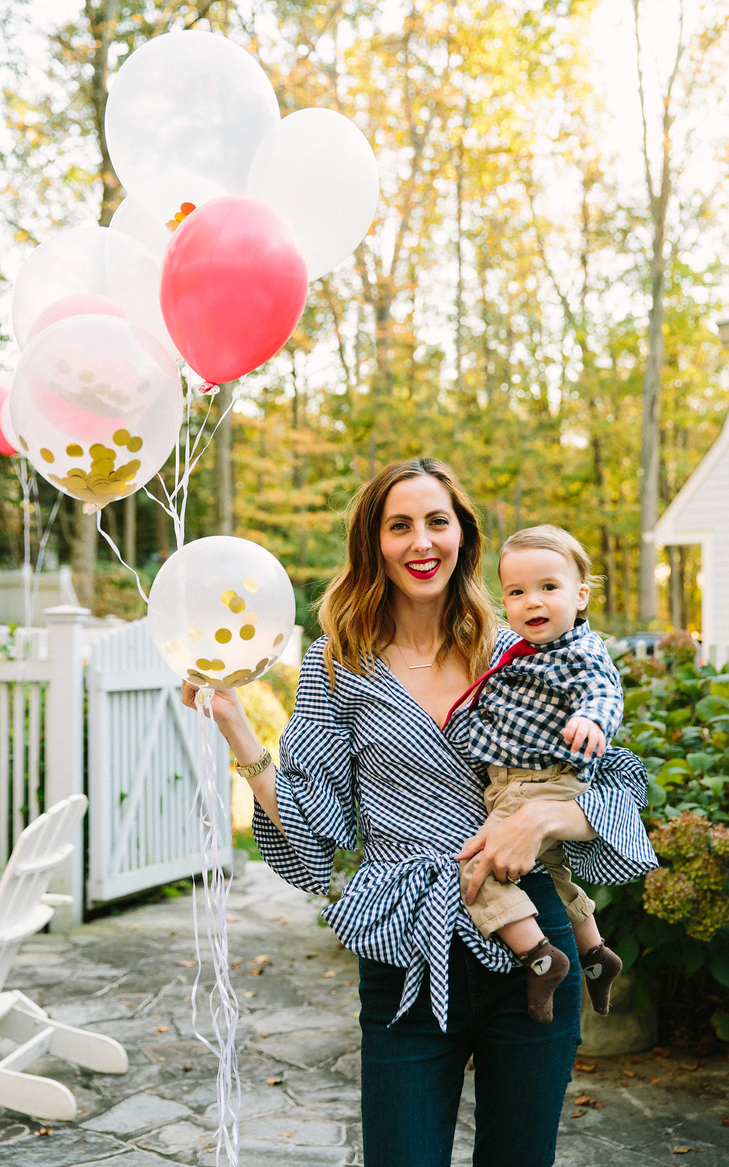 Eva Amurri Martino holds one year old son Major as they celebrate his first birthday with a teddy bear picnic themed party