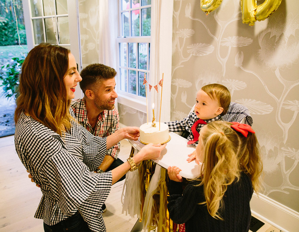 Eva Amurri Martino carries her son's first birthday cake