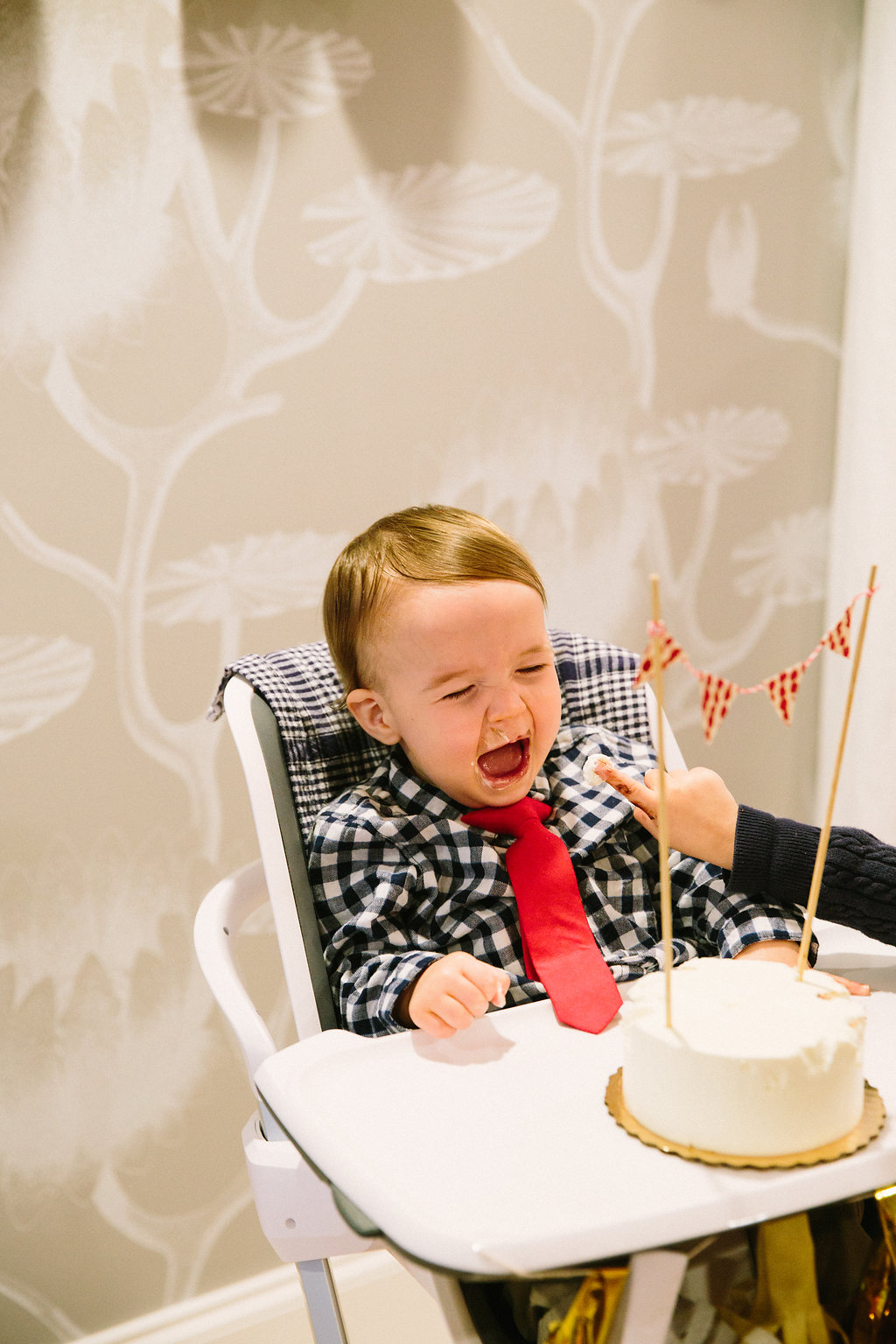 Eva Amurri Martino carries her son's first birthday cake