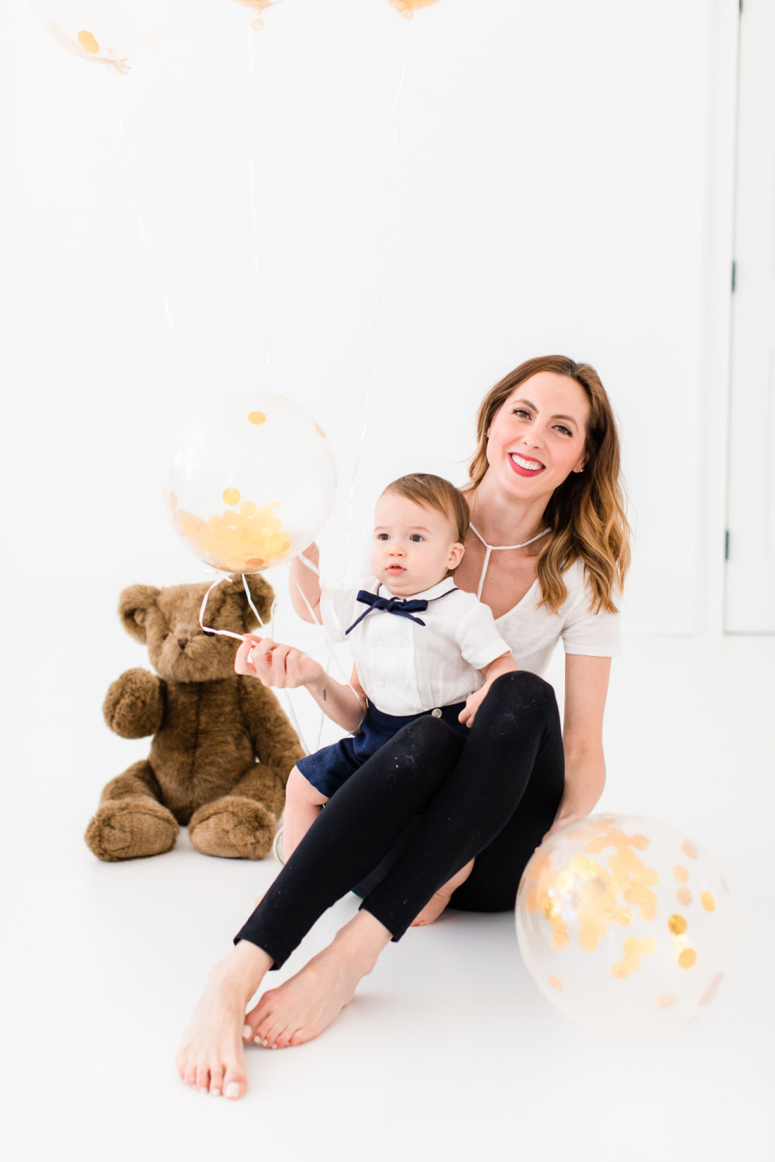 Eva Amurri Martino sits with one year old son Major for his first birthday portraits
