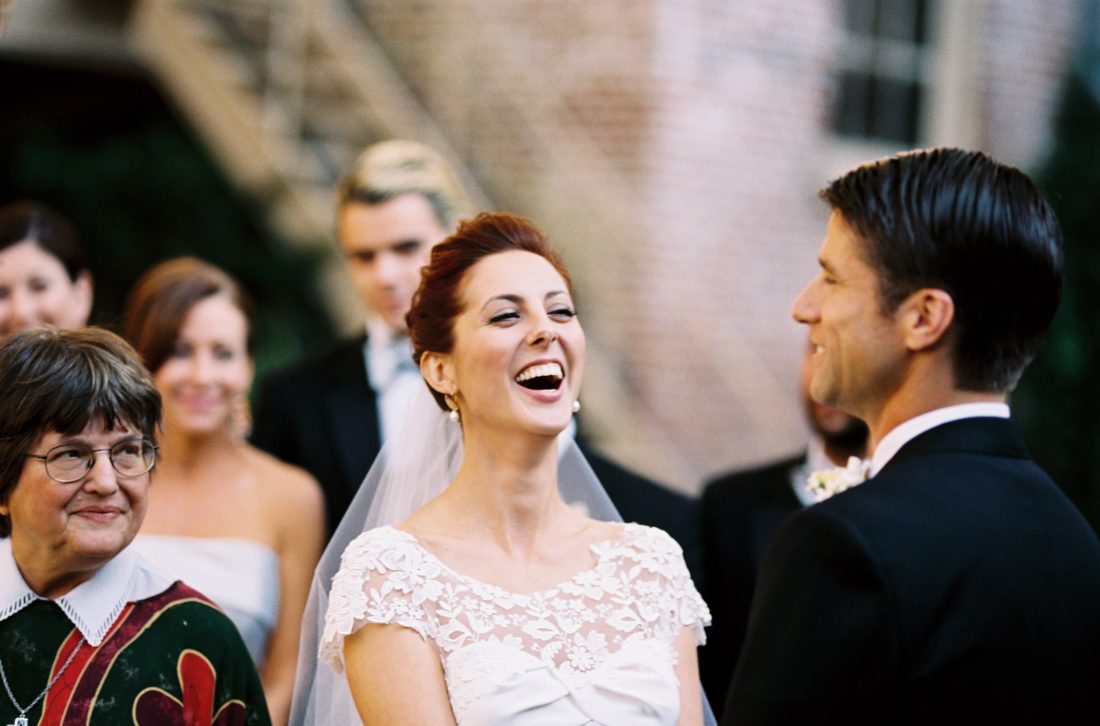 Eva Amurri Martino and Kyle Martino laugh together at the altar on their wedding day
