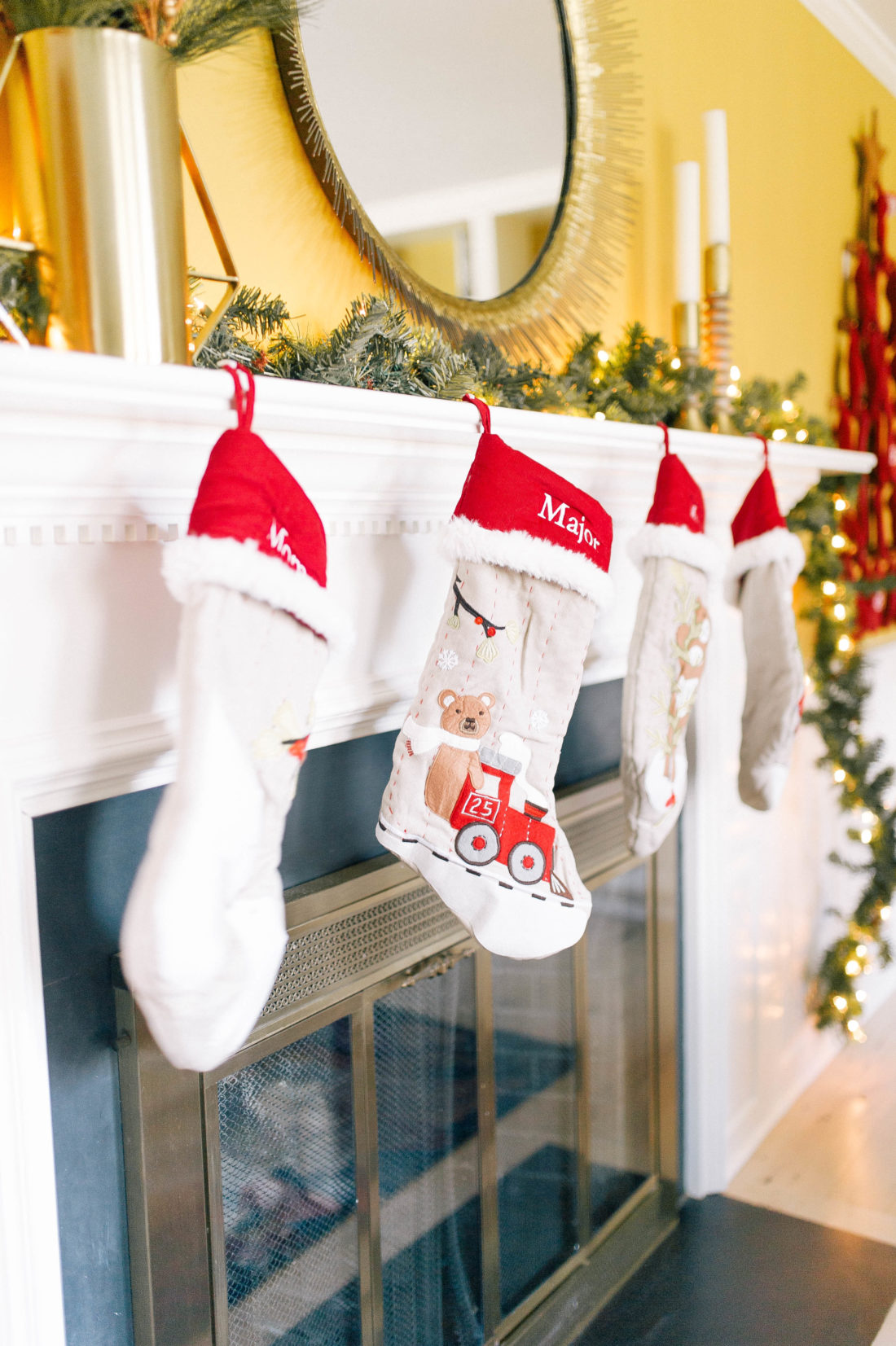 personalized stockings hang off of the mantel in Eva Amurri Martino's Connecticut home