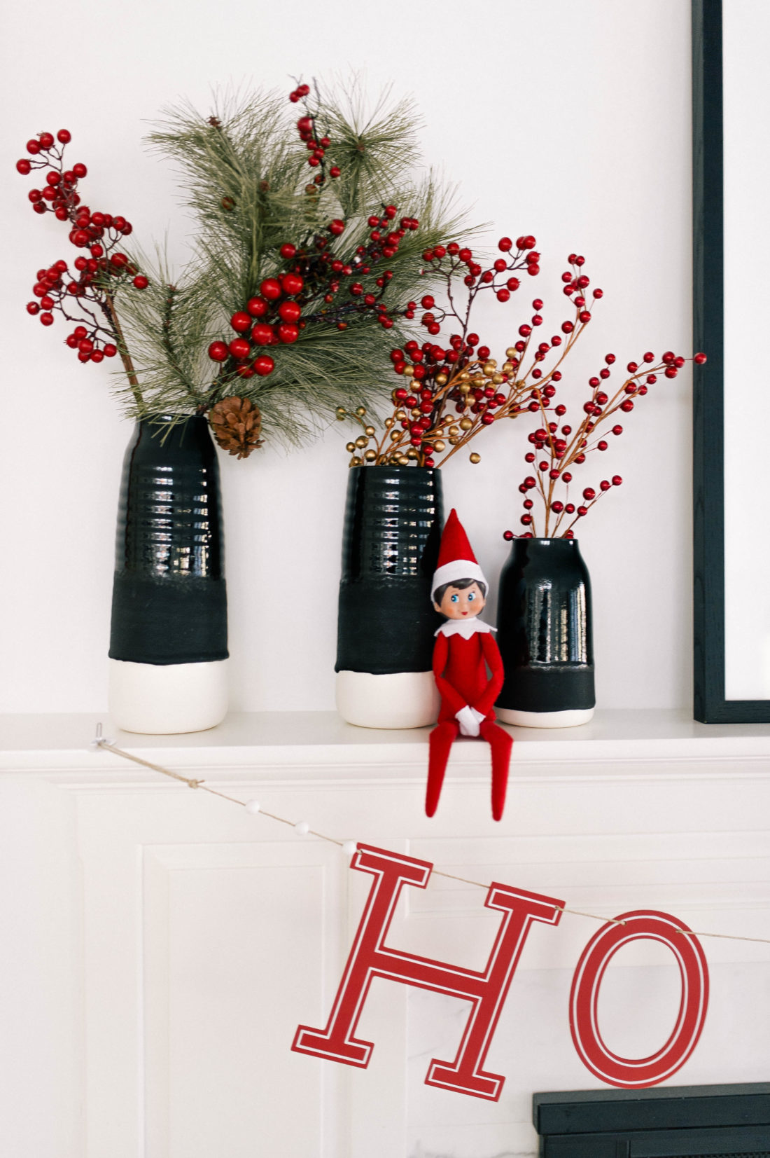 The elf sits on the spruced up shelf as part of the holiday decor in Eva Amurri Martino's Connecticut home