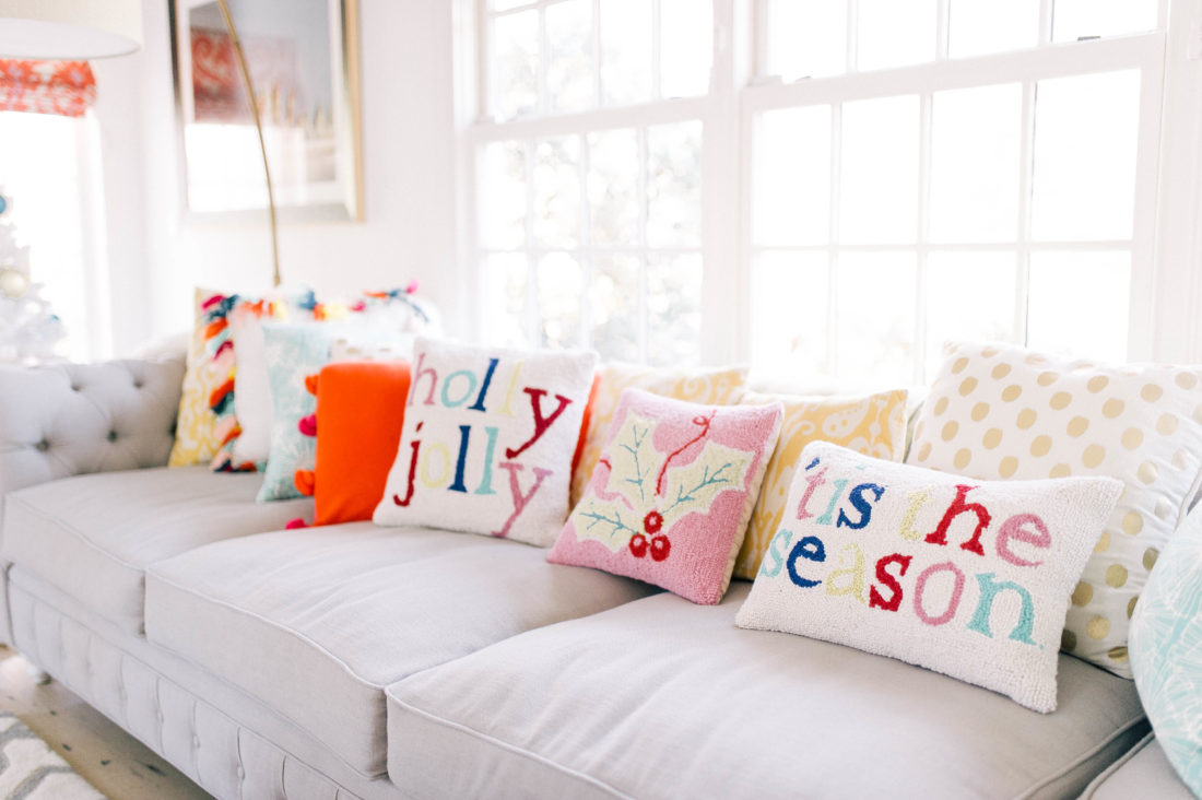 festive holiday pillows on the couch of Eva Amurri Martino's connecticut home