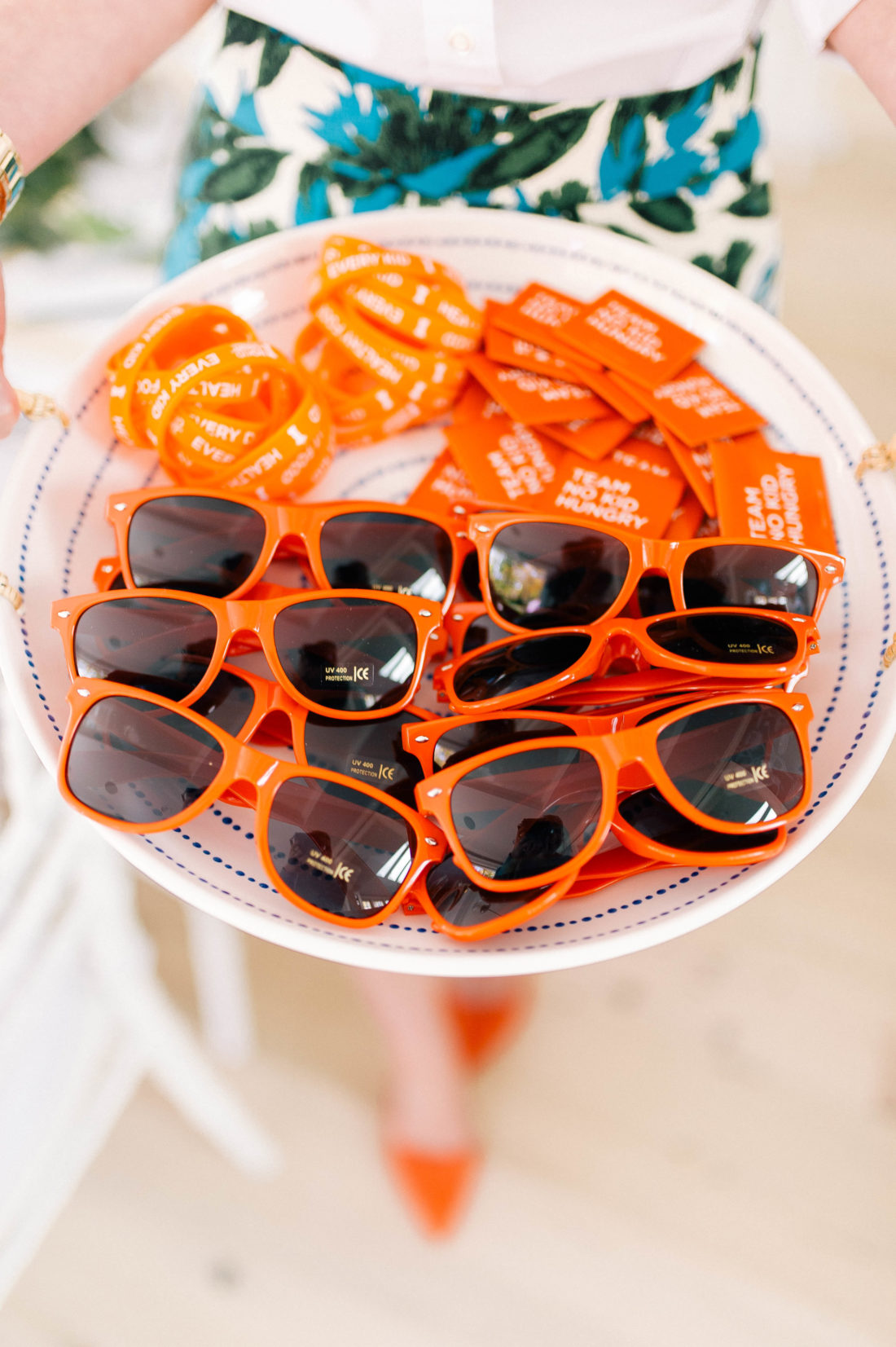 An assortment of orange No Kid Hungry swag at the Friendsgiving at Eva Amurri Martino's Connecticut home