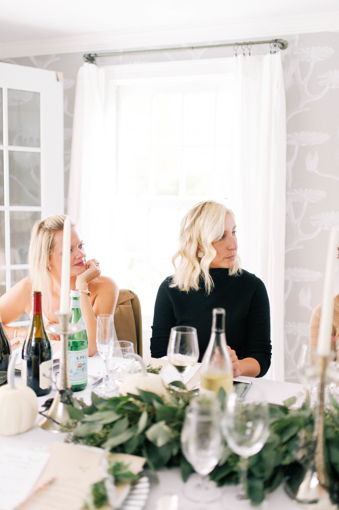 Guests listen as Eva Amurri Martino speaks about her involvement with No Kid Hungry for Friendsgiving