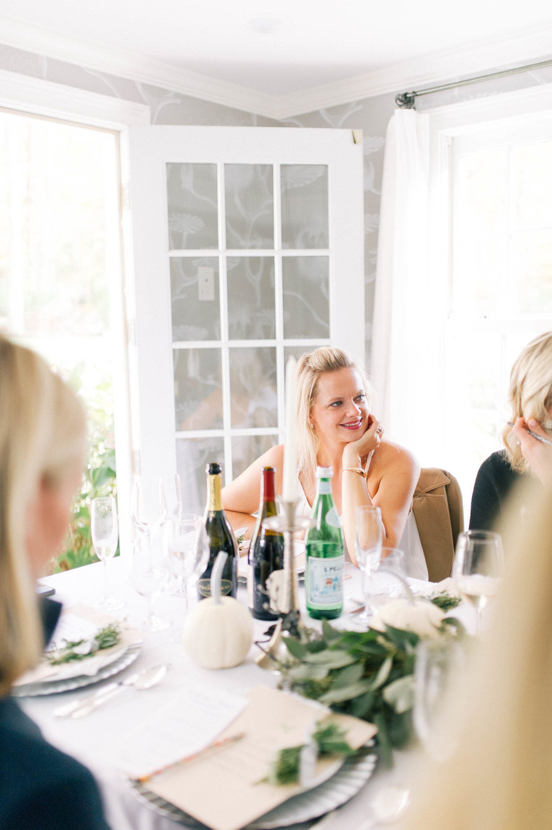 Guests listen as Eva Amurri Martino speaks about her involvement with No Kid Hungry for Friendsgiving