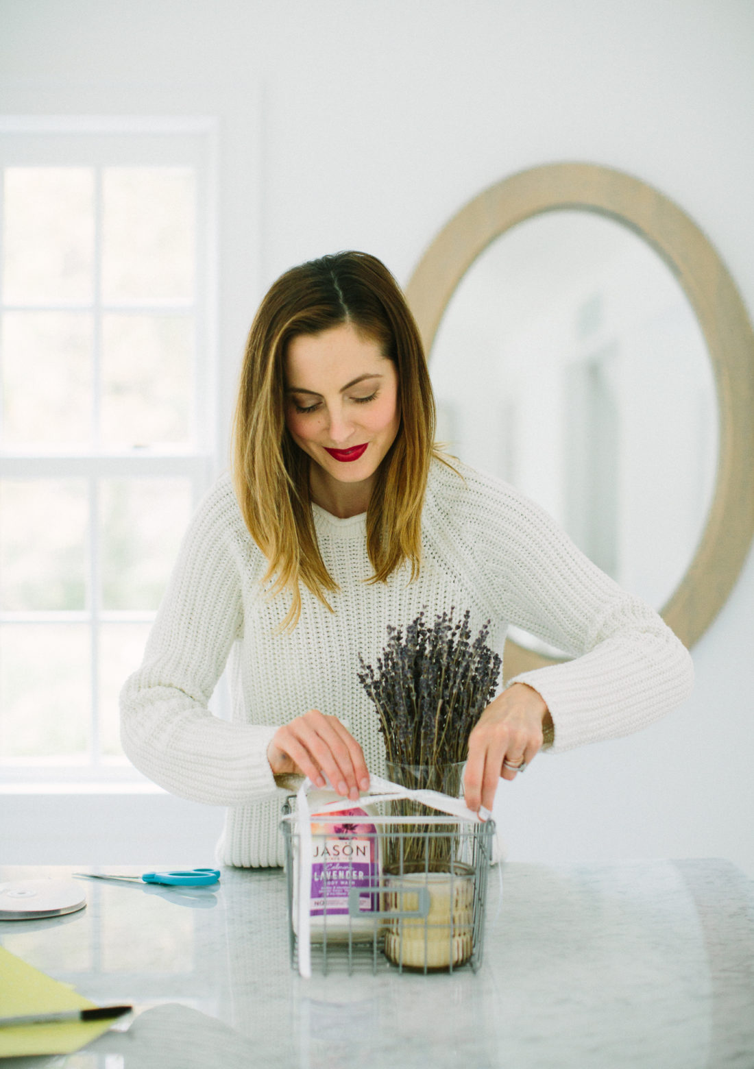 Eva Amurri Martino ties a bow on her Welcome gift for houseguests