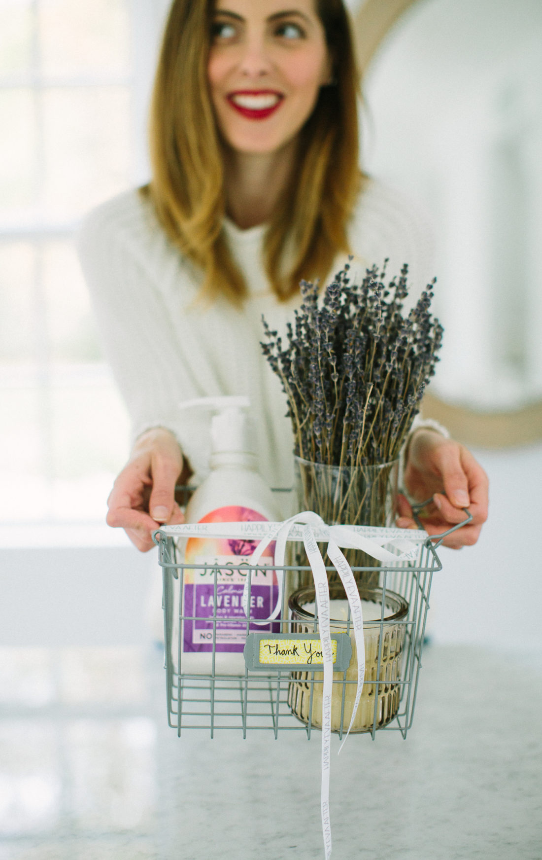 A wire basket filled with Lavender goodies curated by Eva Amurri Martino