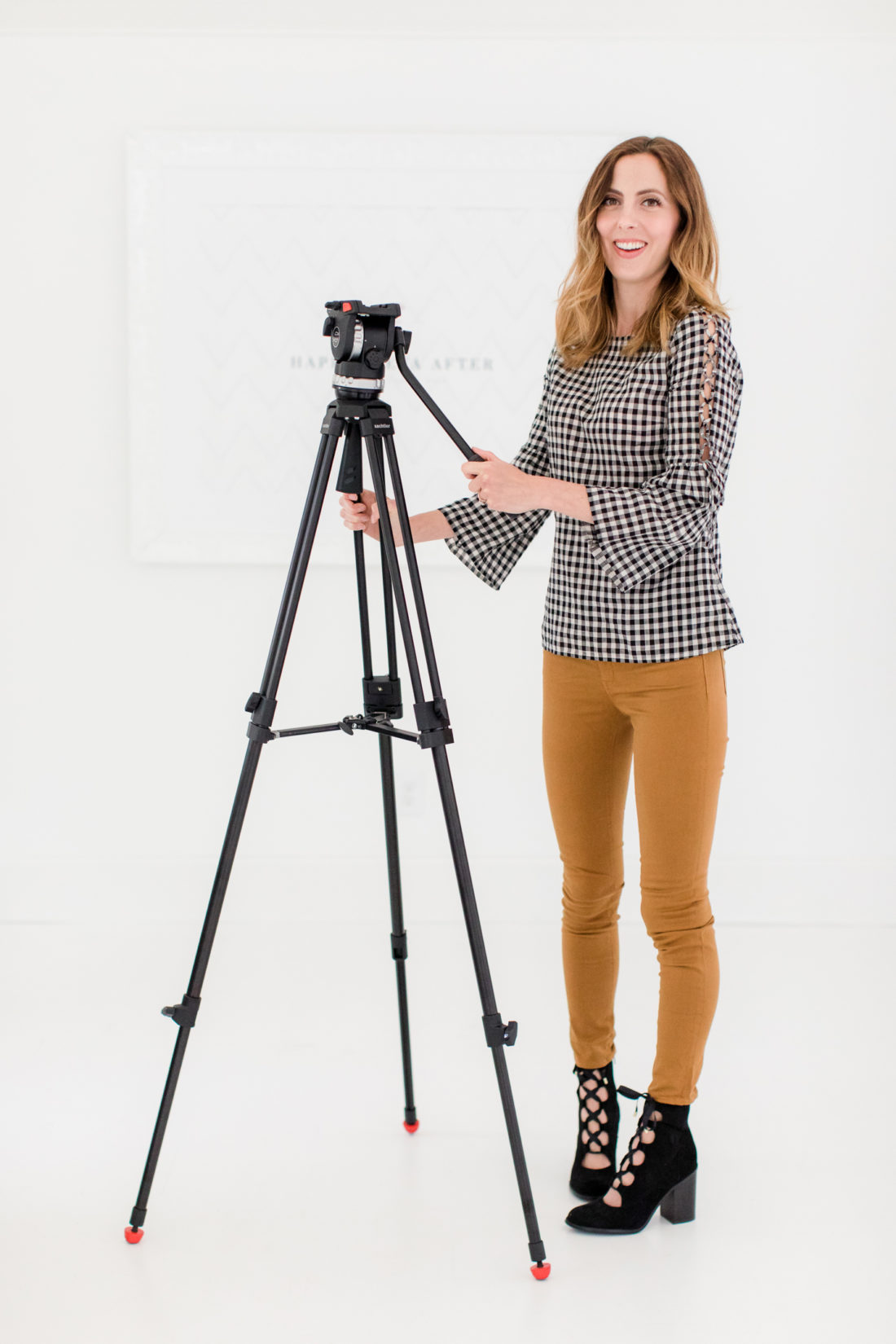 Eva Amurri Martino stands with her camera tripod in the Happily Eva After studio in Connecticut