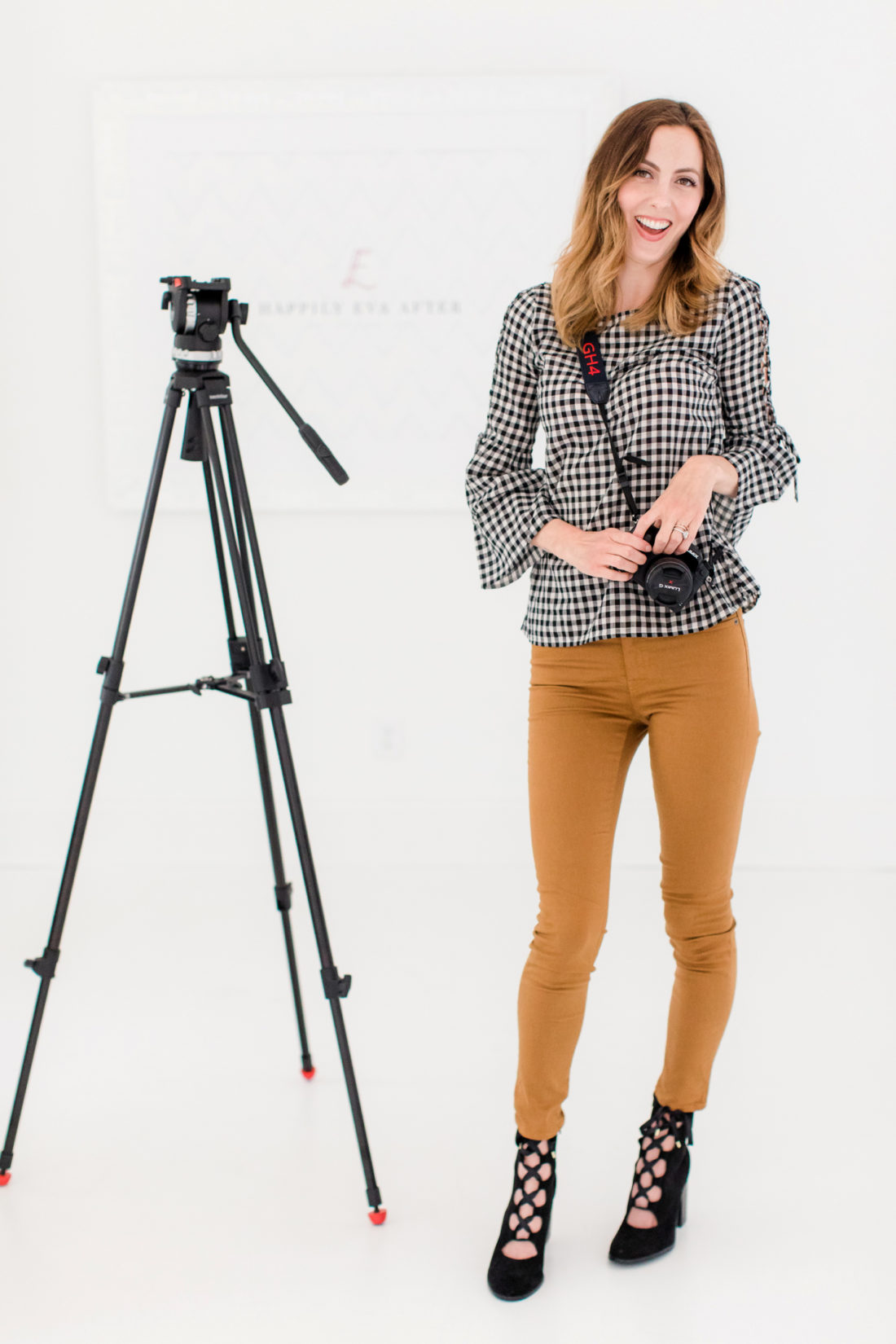 Eva Amurri Martino stands with her camera tripod in the Happily Eva After studio in Connecticut