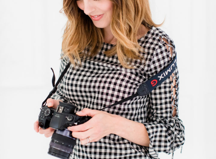 Eva Amurri Martino checks out the photos taken on her DLSR camera