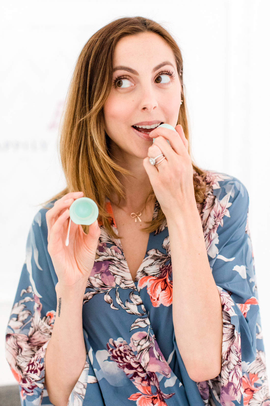 Eva Amurri Martino applies lip balm to her lips