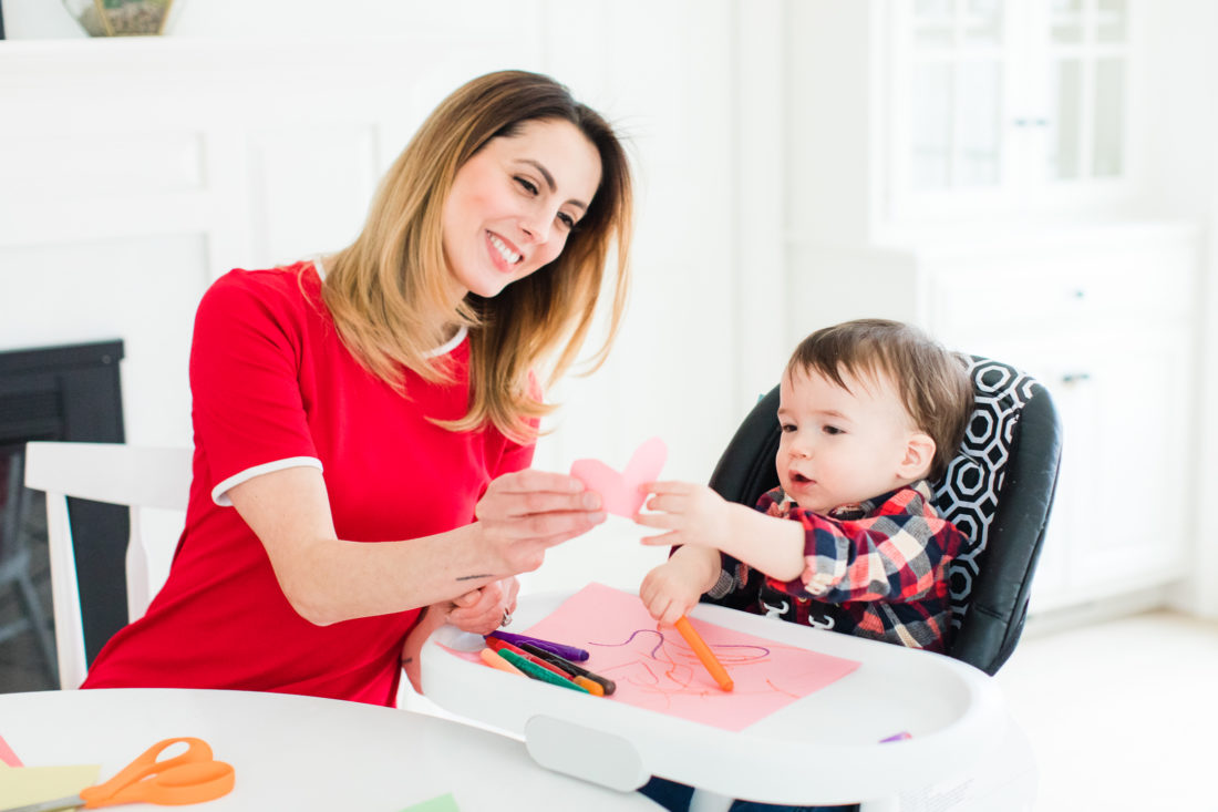 Eva Amurri Martino hands Major Martino a cutout paper heart