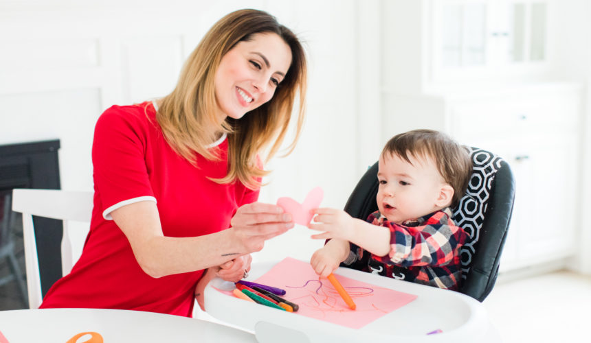 Eva Amurri Martino hands Major Martino a cutout paper heart