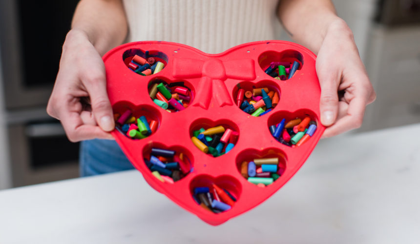 Eva Amurri Martino prepares to make crayon hearts out of bits of broken crayons in a heart mold