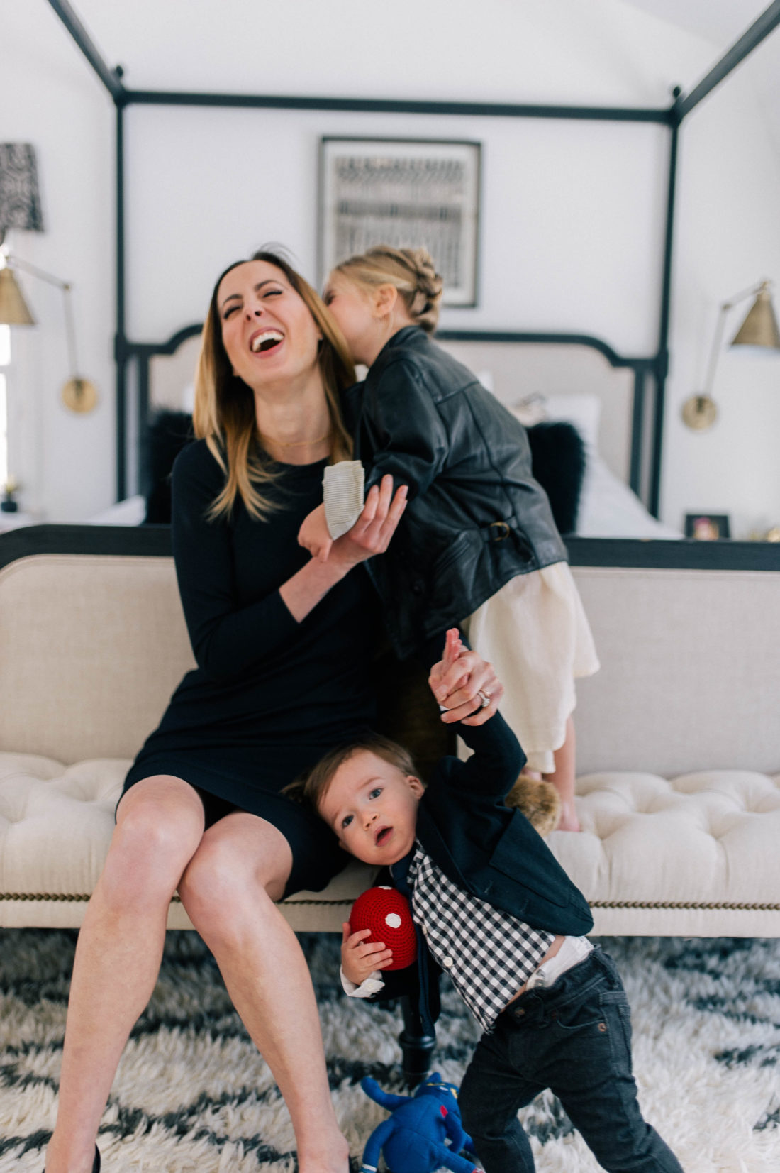 Eva Amurri Martino laughs with her daughter Marlowe and son Major at the foot of her bed in her house in Connecticut.