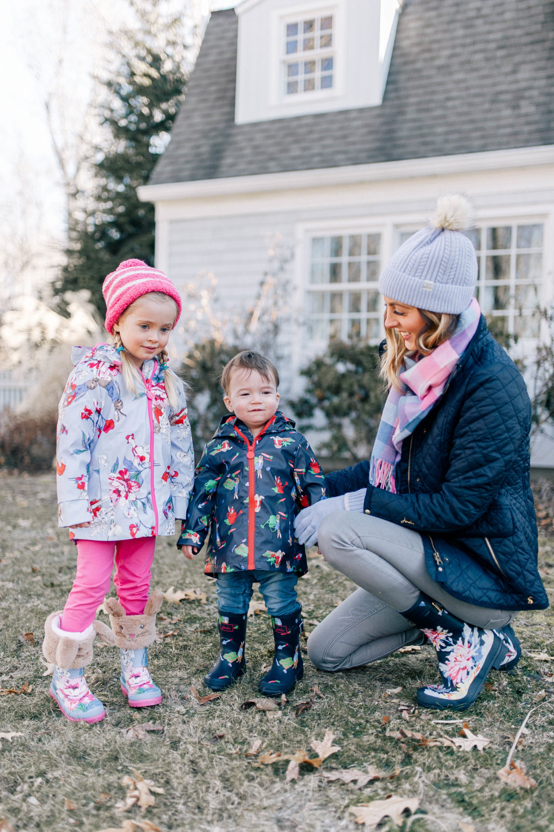 Eva Amurri Martino gets her two children bundled up in rain boots and coats to play outside of their Connecticut home