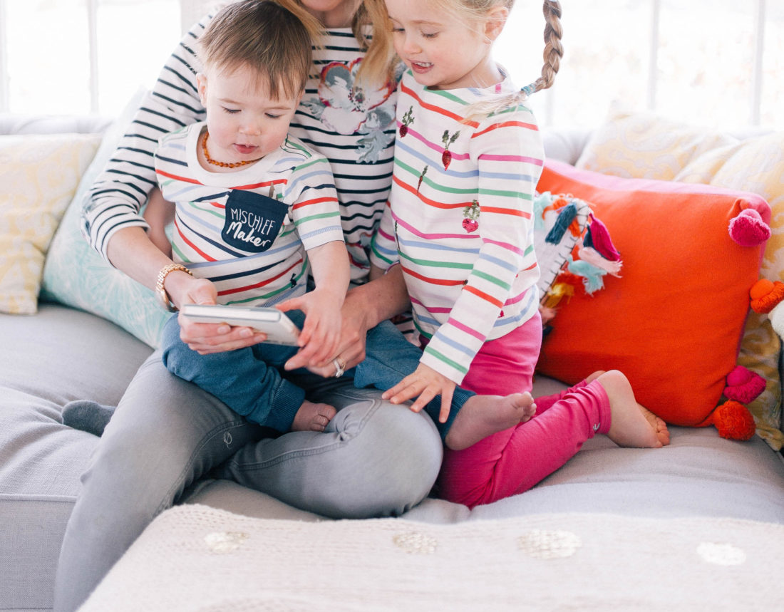 Eva Amurri Martino and her two children snuggle on the couch and read Peter Rabbit