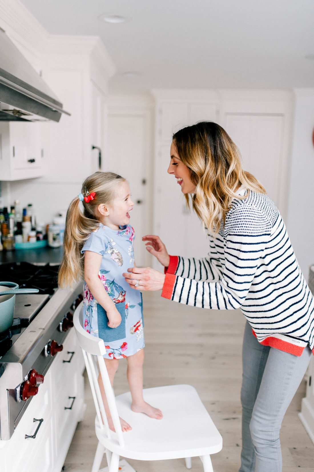 Eva Martino tickles Marlowe in the kitchen of their Connecticut home