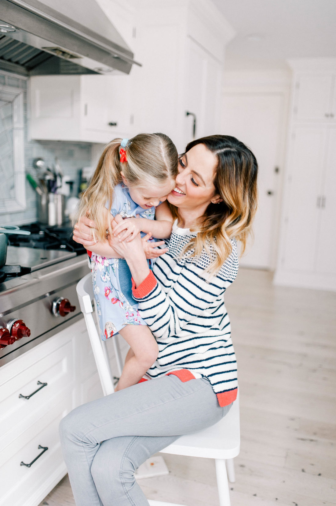 Eva Amurri Martino and Marlowe Martino laugh in the kitchen of their connecticut home