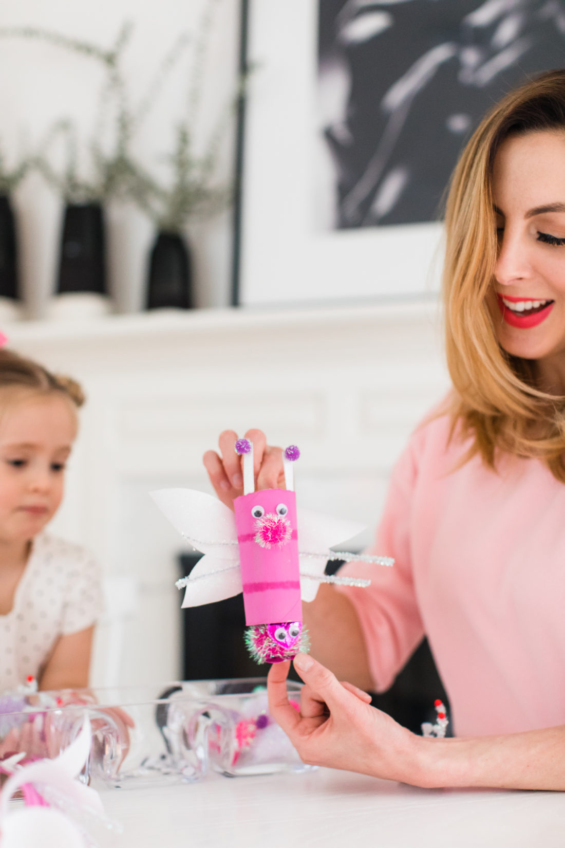 Eva Amurri Martino shows how the baby Lovebugs fit inside the Mommy Lovebugs as part of her Valentine's Day kids craft