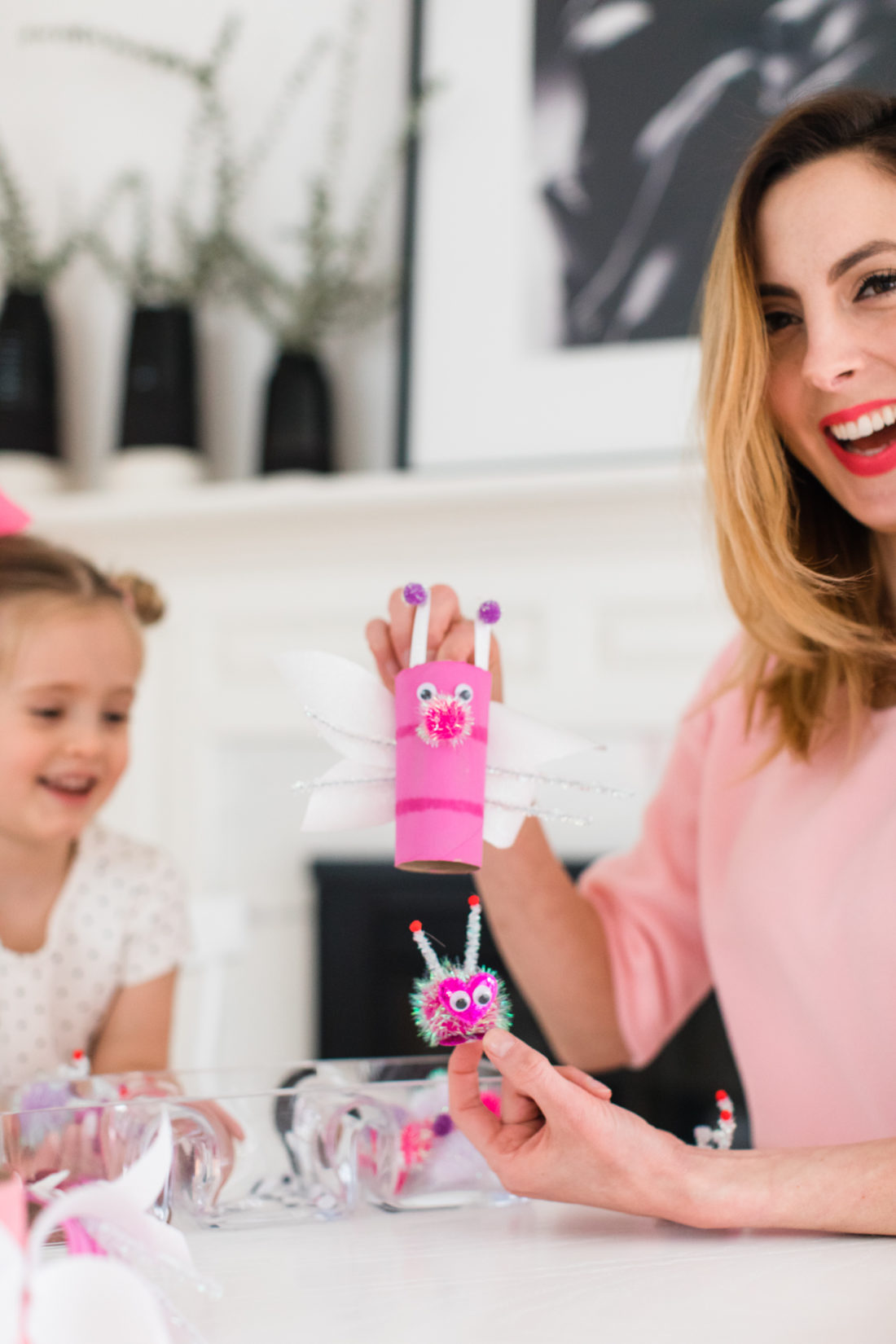 Eva Amurri Martino shows how the baby Lovebugs fit inside the Mommy Lovebugs as part of her Valentine's Day kids craft