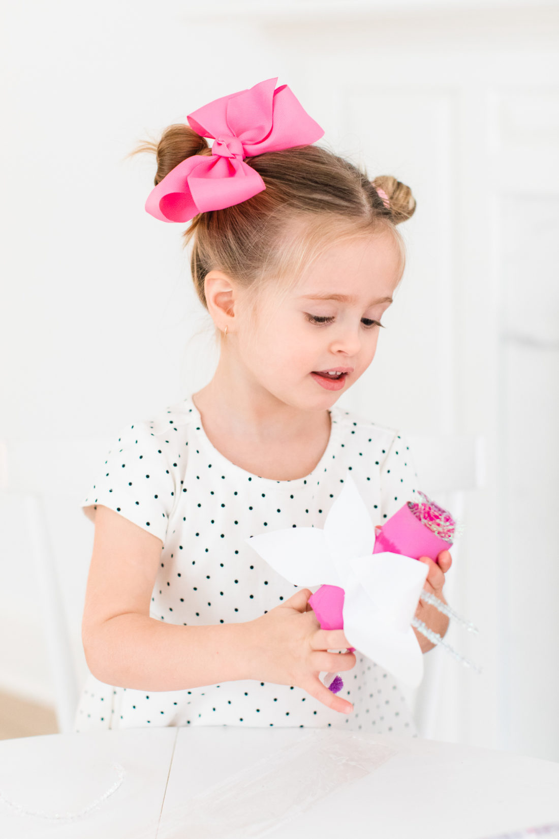 Marlowe Martino has fun crafting DIY Lovebugs for Valentine's Day at her kitchen table