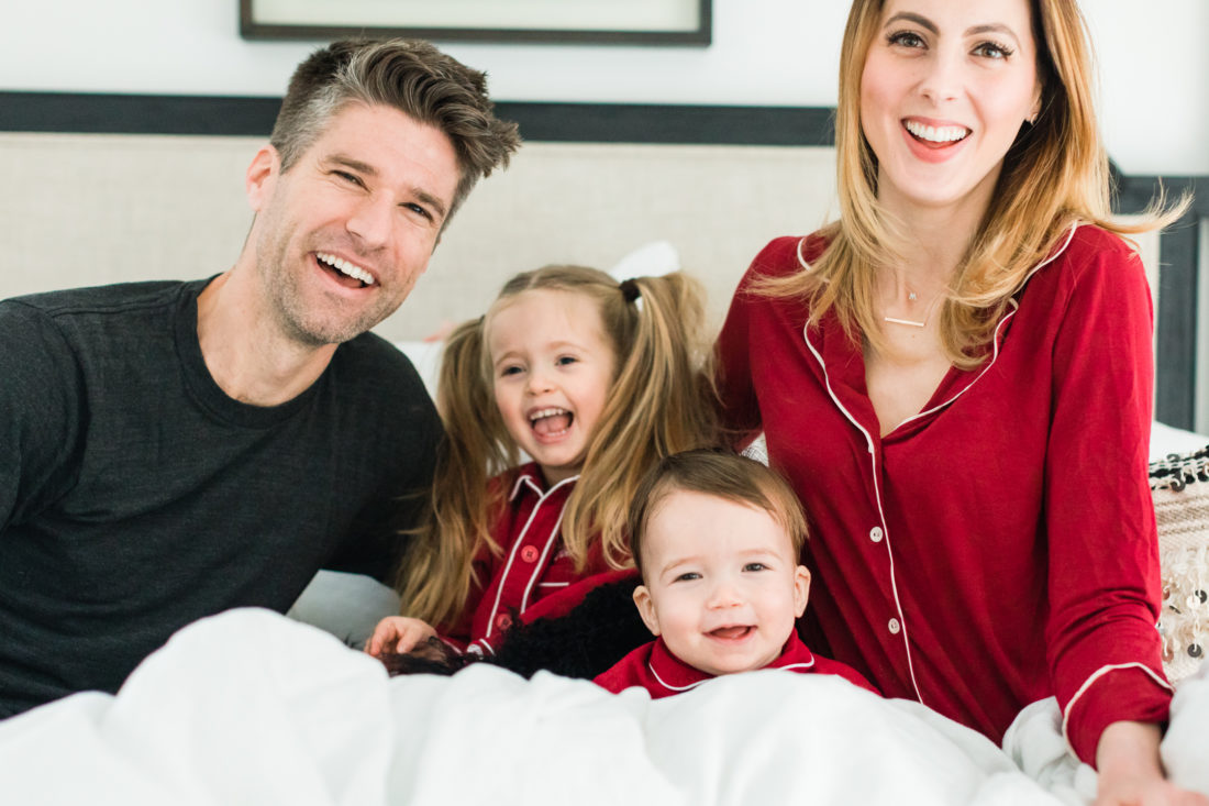 Eva Amurri Martino, Kyle Martino, and children Marlowe and Major Martino, cuddle together in bed wearing red pajamas for Valentine's Day