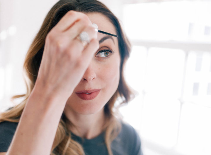 Eva Amurri Martino sits in front of the vanity in the Glam Room at her Connecticut home and fills in her eyebrows