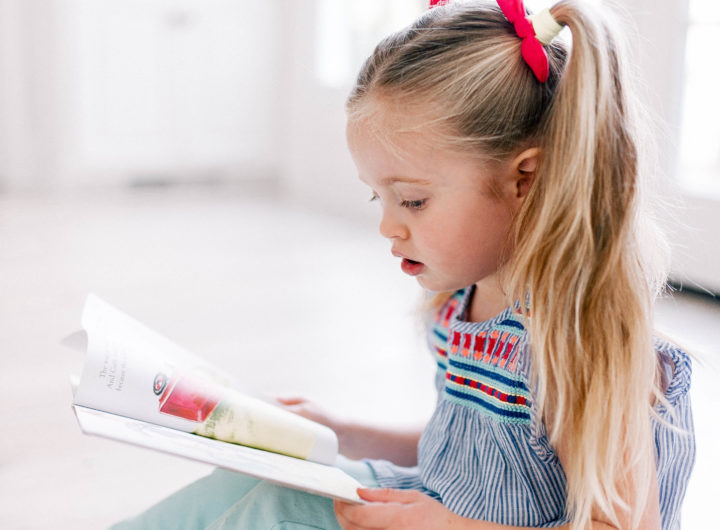 Eva Amurri's daughter Marlowe reads one of her favorite kids' book on the kitchen floor of her Connecticut home.