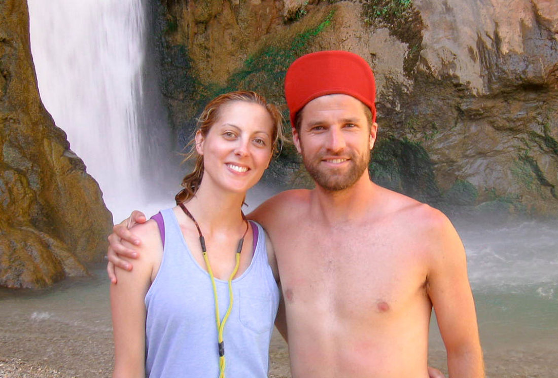 Eva Amurri Martino poses with husband Kyle in front of a waterfall while rafting in the Grand Canyon