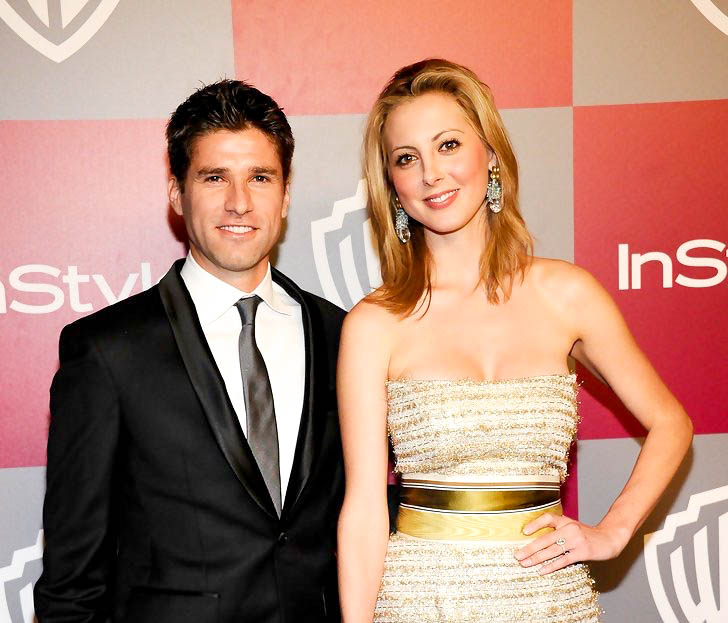 Eva Amurri Martino and Kyle Martino pose on the red carpet at the InStyle Golden Globes bash