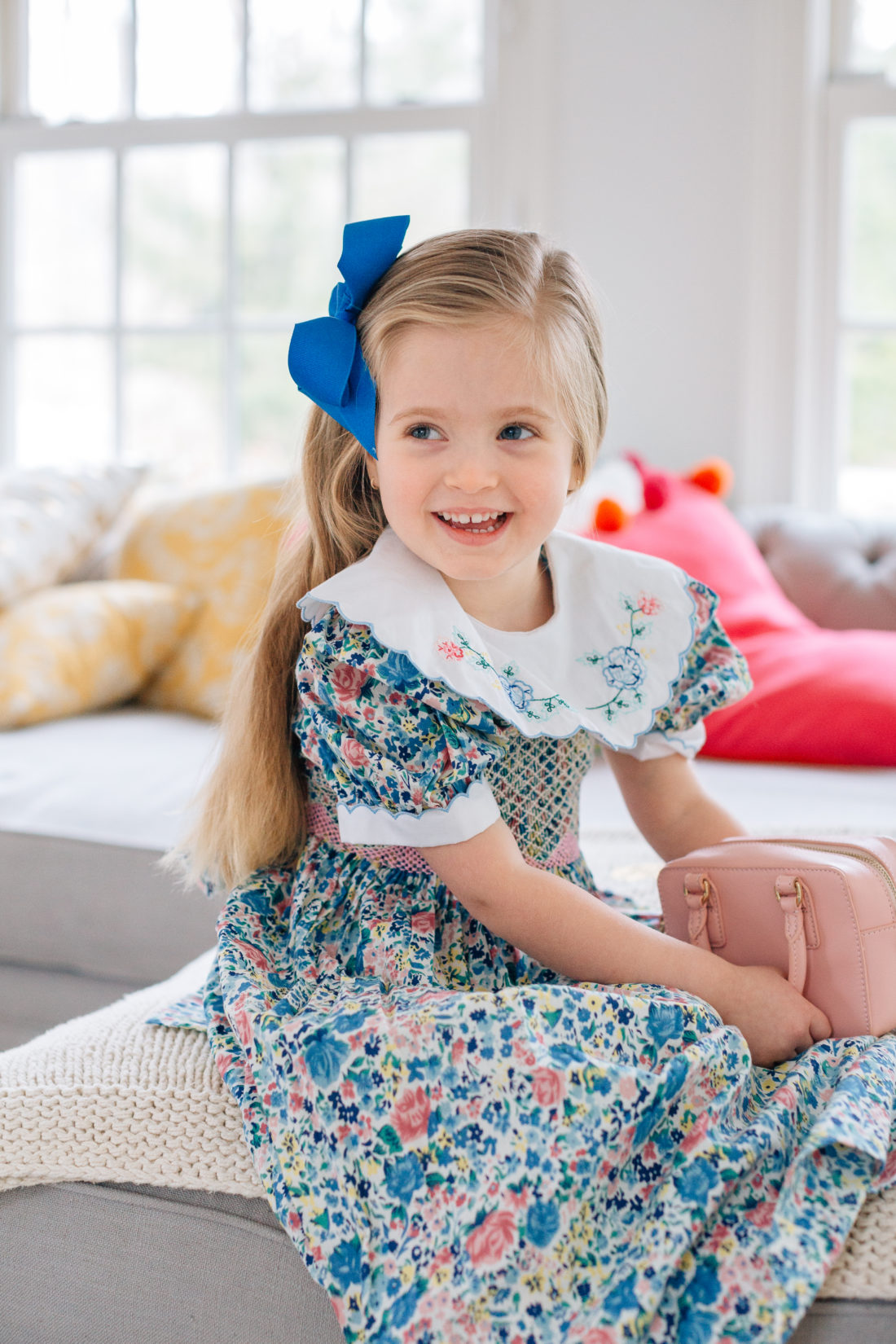 Marlowe Martino wears a vintage floral smocked dress for Easter with an embroidered collar that belonged to mother Eva Amurri Martino