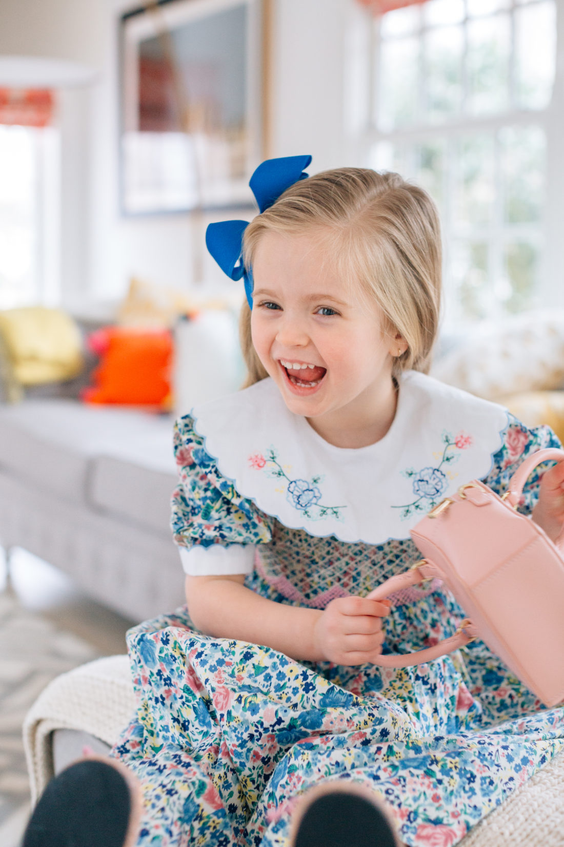 Marlowe Martino wears a vintage floral smocked dress for Easter with an embroidered collar that belonged to mother Eva Amurri Martino