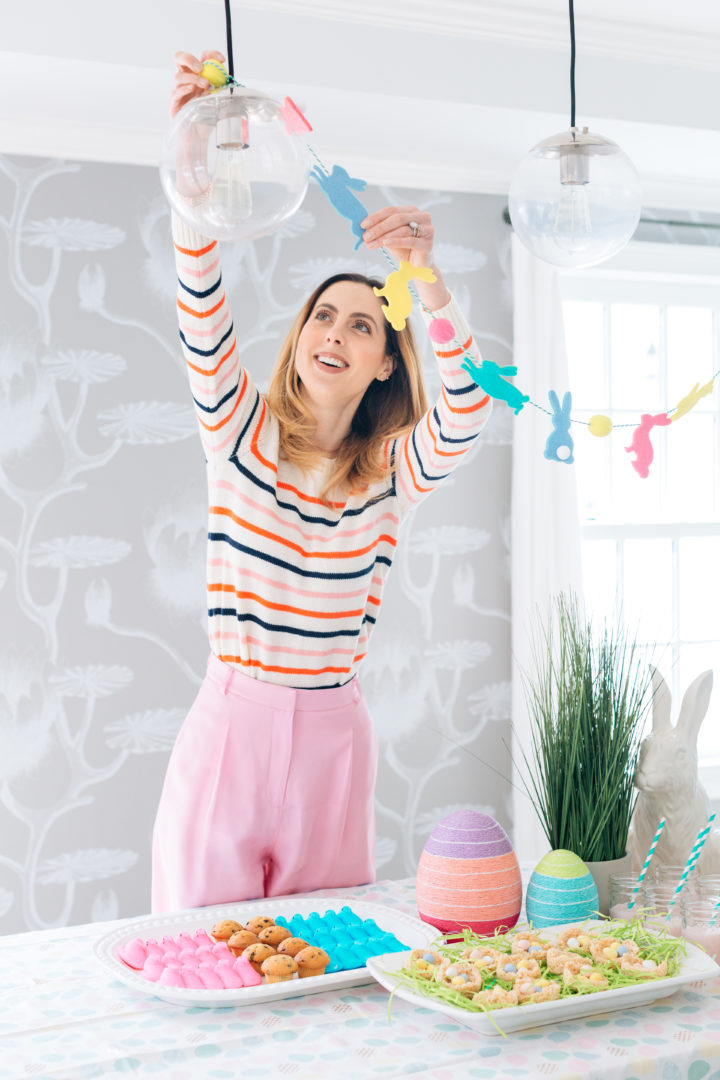 Eva Amurri Martino puts the finishing touches on the Easter decorations before her annual Easter Egg Hunt