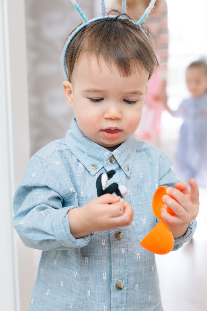 Major Martino opening an orange easter egg