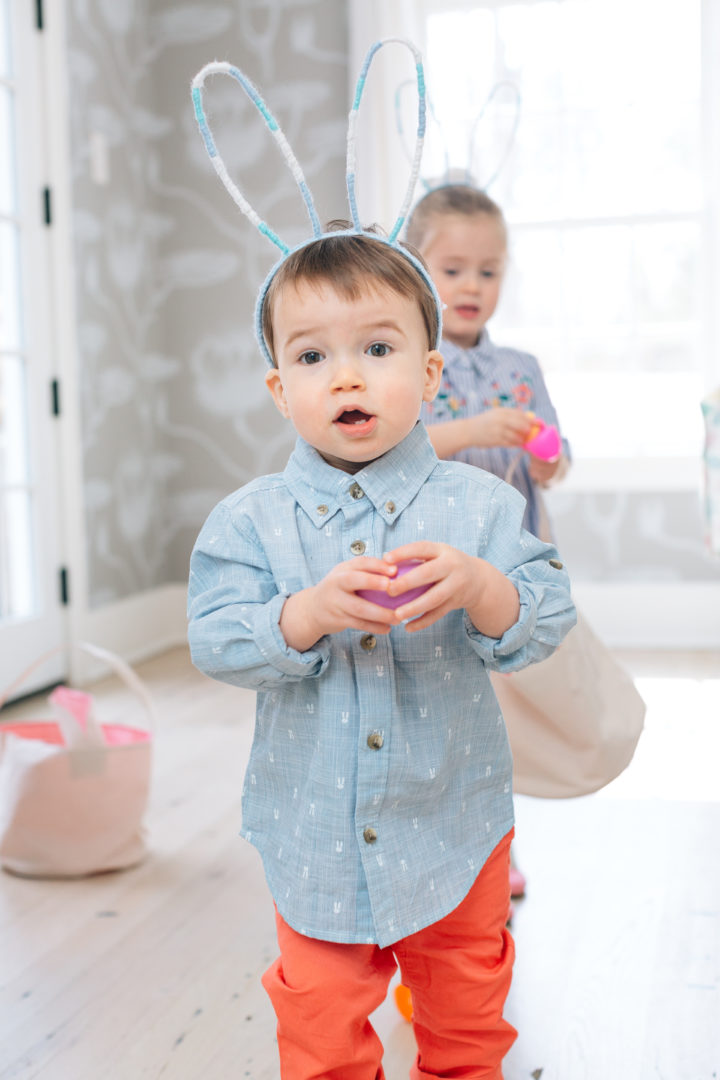 Major Martino finding eggs at his family's Easter Egg Hunt at their home in Connecticut.