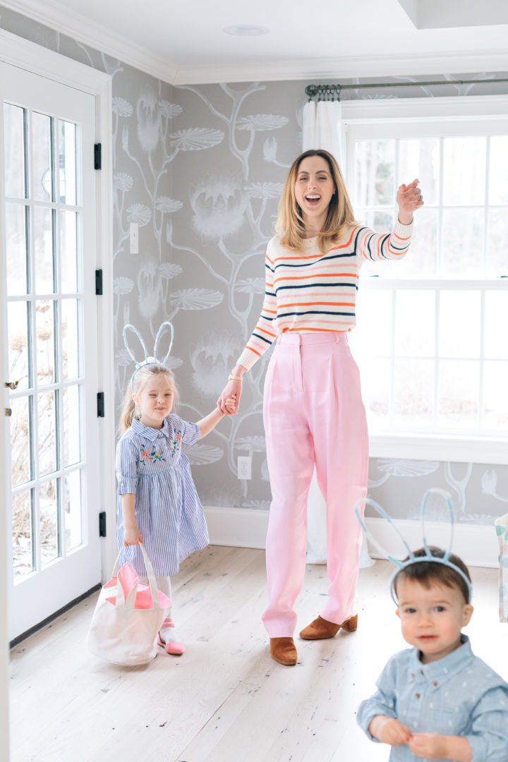 Eva Amurri Martino laughing with her children Marlow and Major who are wearing bunny ears for their annual Easter Egg Hunt