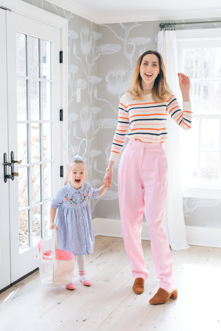 Eva Amurri Martino holding daughter Marlowe's hand who is wearing bunny ears for their annual Easter Egg Hunt