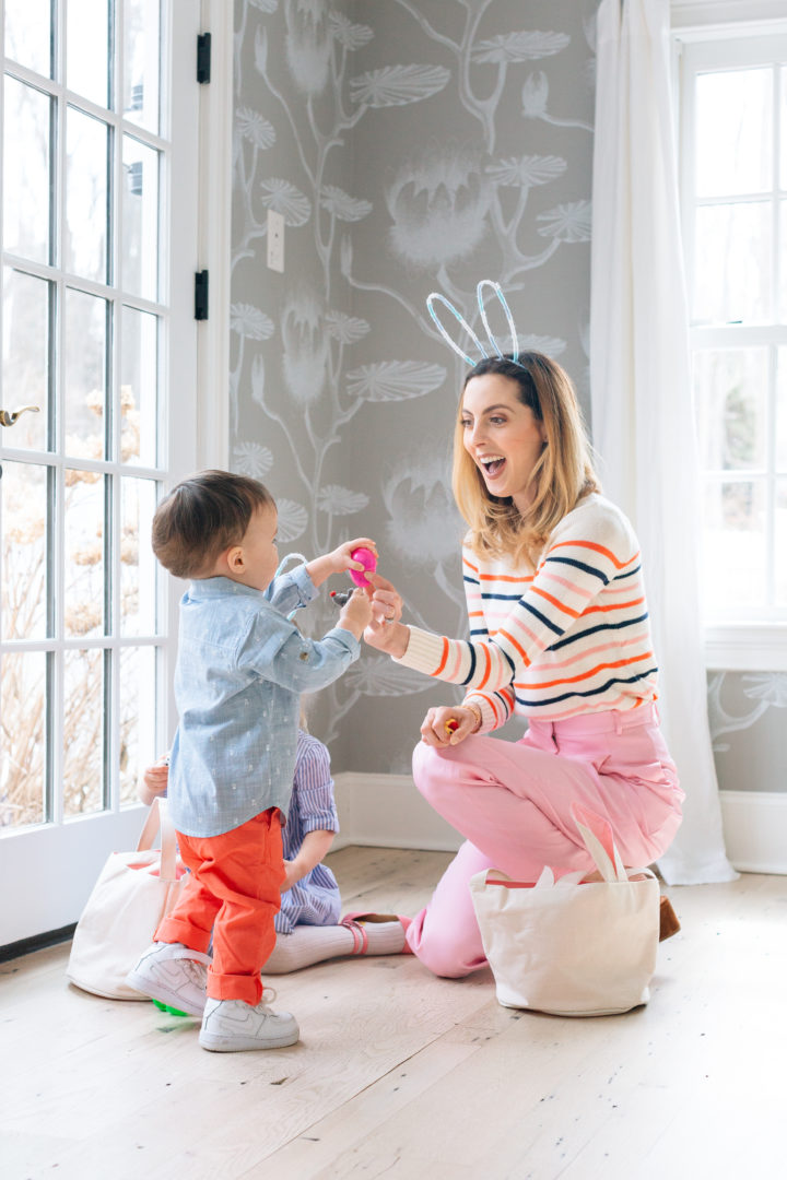 Eva Amurri Martino giving a plastic egg during her annual Easter Egg Hunt with her son Major