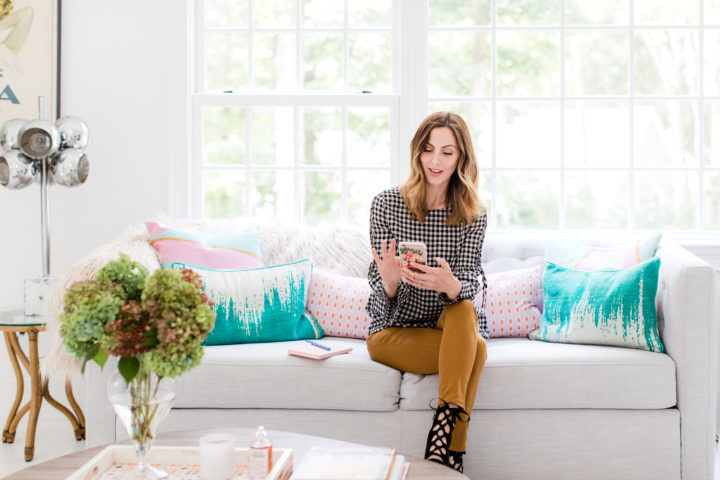 Eva Amurri Martino scrolls through her cell phone while she sits in the Happily Eva After studio in Connecticut