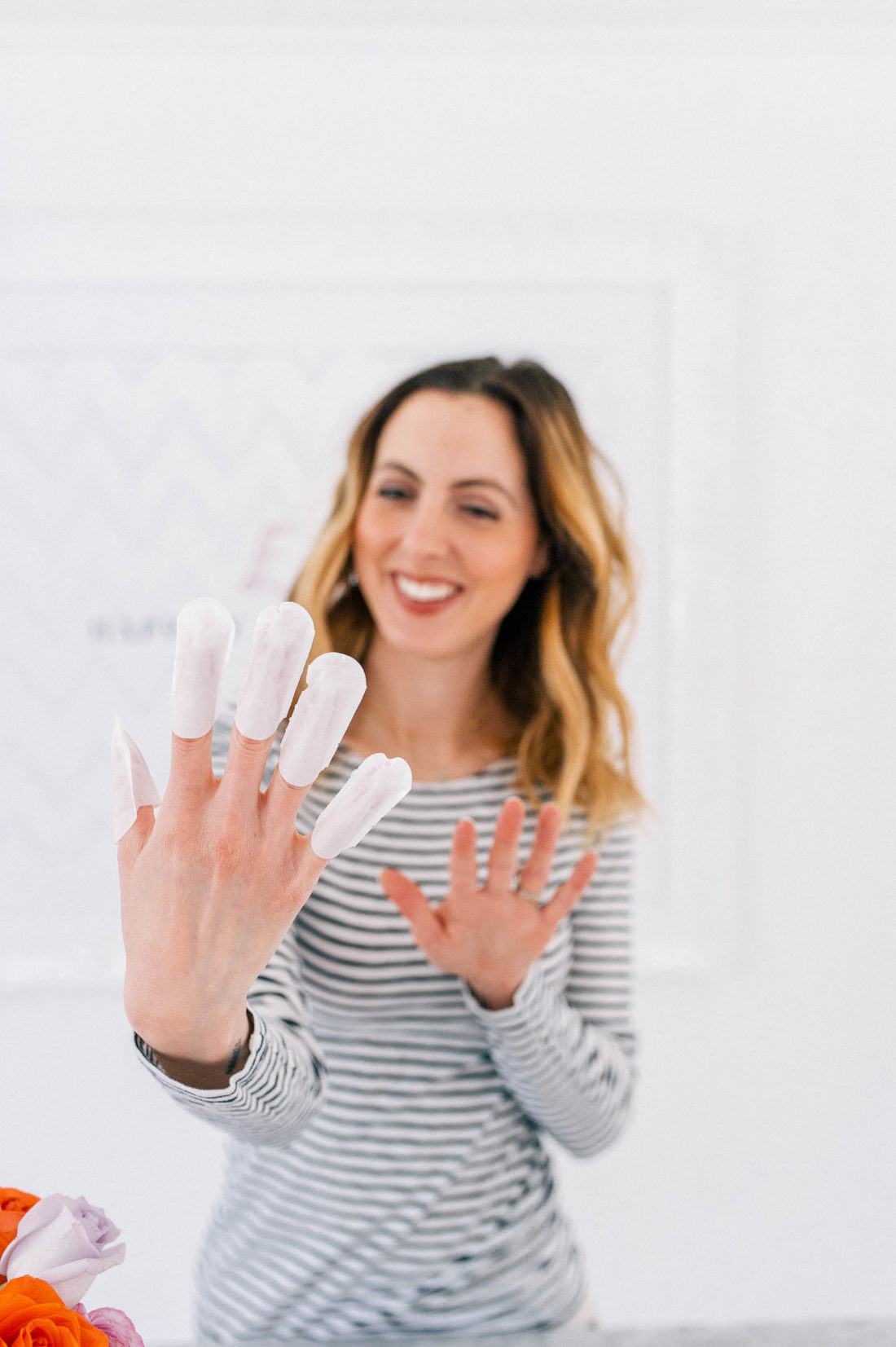 Eva Amurri Martino shows off a multivitamin nail mask as part of her monthly obsessions roundup