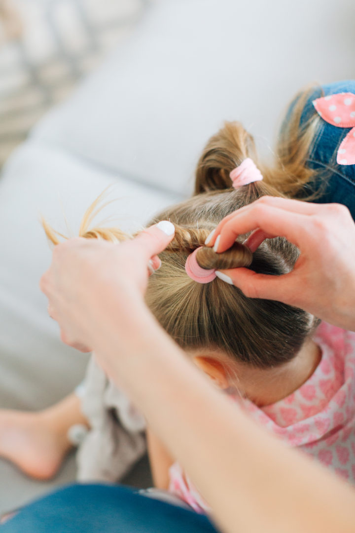 Eva Amurri Martino put her daughter Marlowe's hair into Pigtail Braids secured with pink bow hair ties.