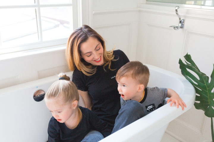Eva Amurri Martino laughs with her daughter Marlowe and son Major in a bathtub in their house in CT