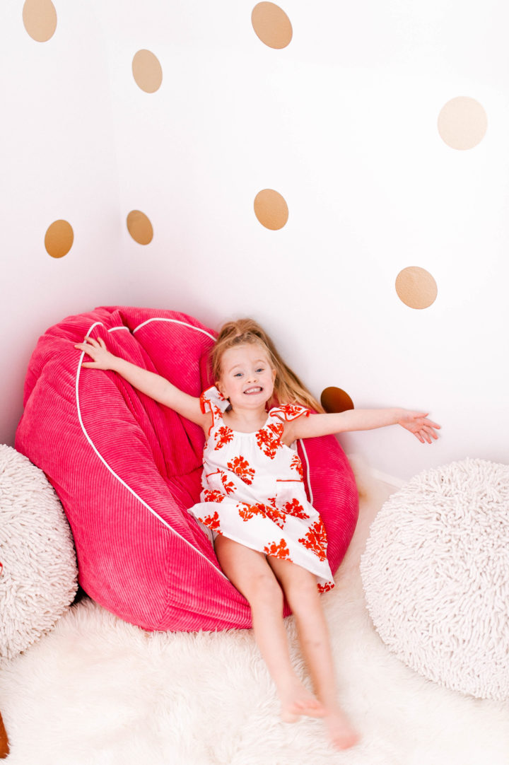 Eva Amurri Martino's daughter Marlowe makes a silly face on a colorful bean bag chair