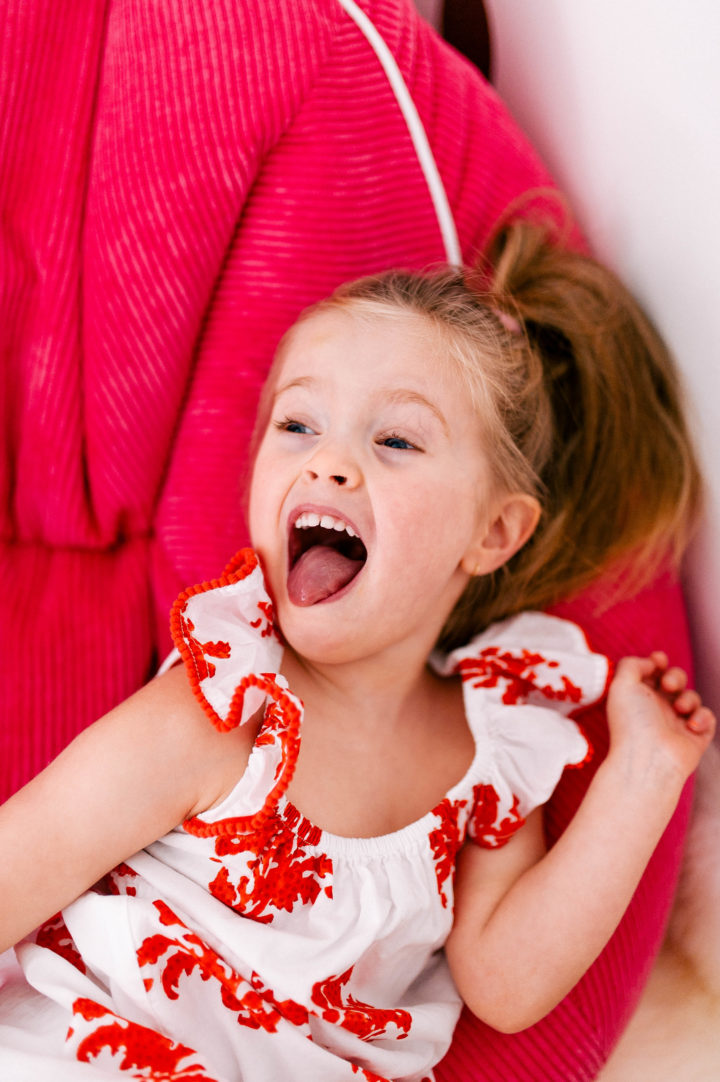 Eva Amurri Martino's daughter Marlowe makes a silly face on a colorful bean bag chair