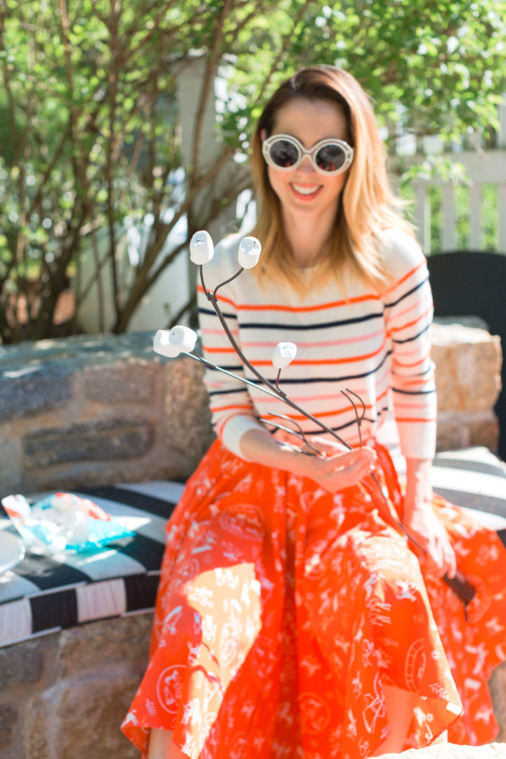 Eva Amurri Martino roasts smores in a colorful frock at her Connecticut home