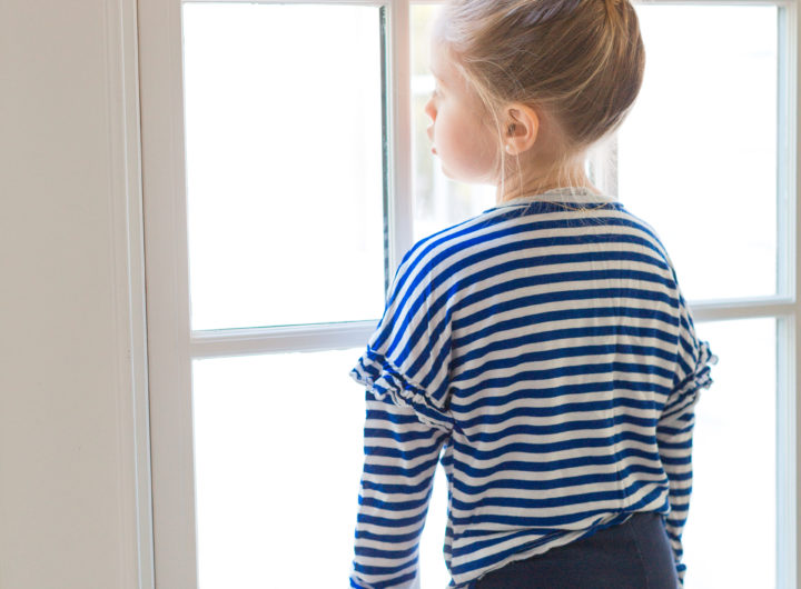 Eva Amurri Martino's daughter Marlowe looks longingly out the window of their Connecticut home