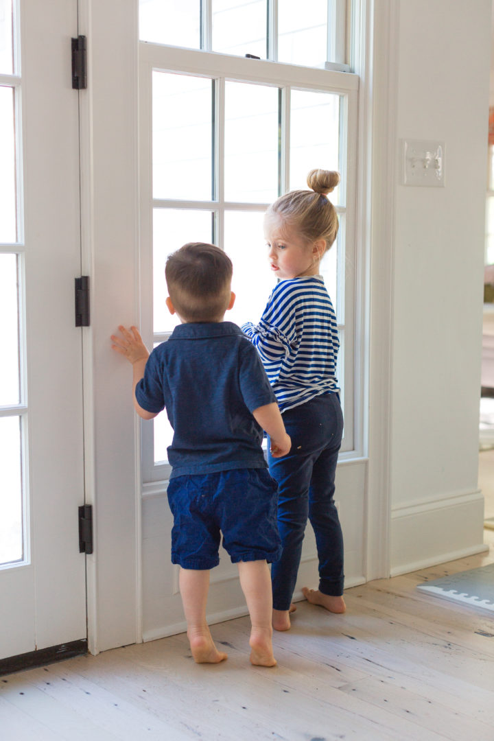 Eva Amurri Martino's children Marlowe and Major look out the window of their Connecticut home